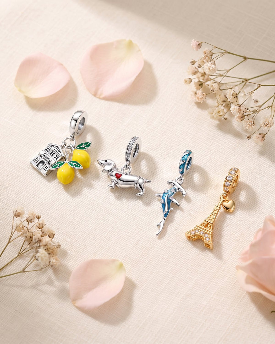 4 sterling silver charms