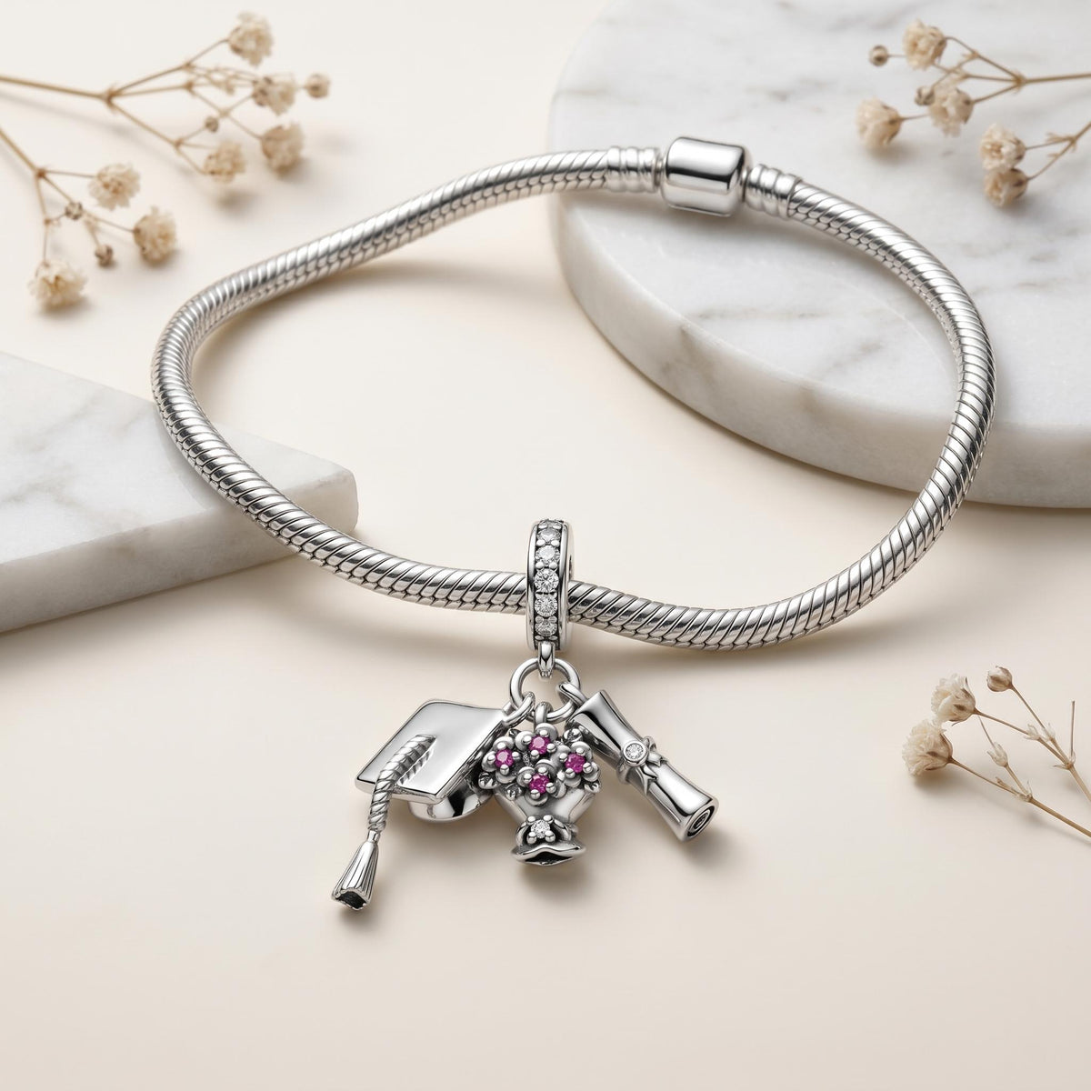 Graduation Cap Charm on a silver charm bracelet