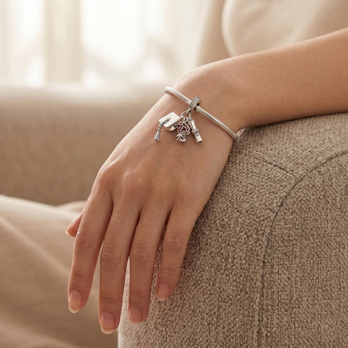 Graduation Cap Charm close-up on a bracelet