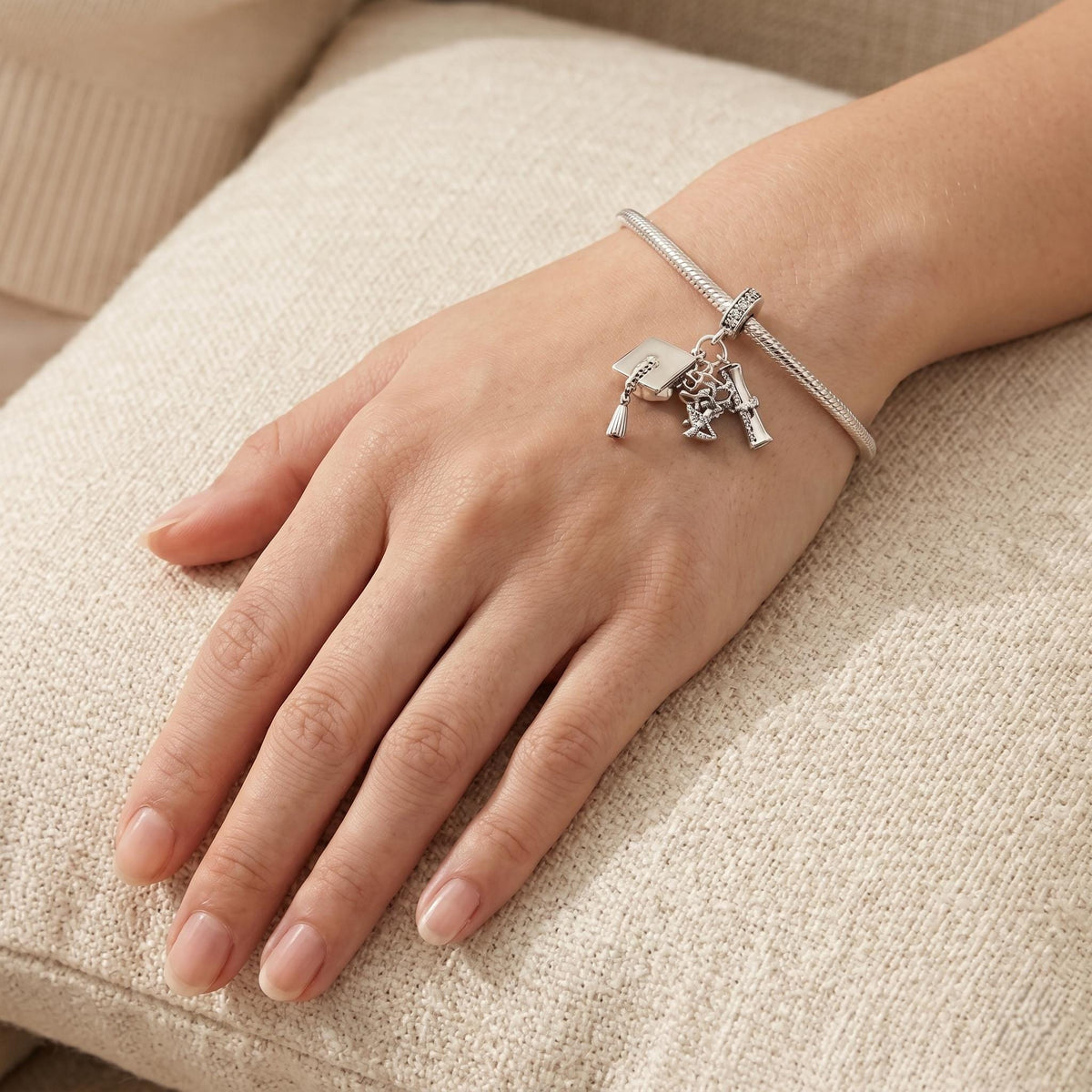 Graduation Cap Charm worn on a charm bracelet