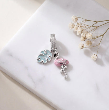 Flamingo Dangle Charm on a silver charm bracelet