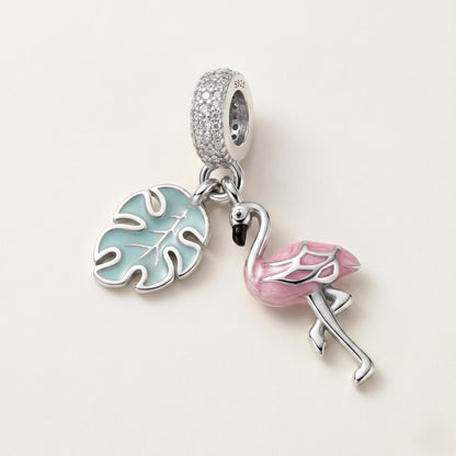 Flamingo Dangle Charm in 925 sterling silver with pink and blue enamel and sparkling stones