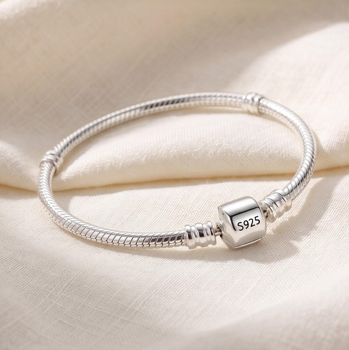 Snake Chain Charm worn on a charm bracelet