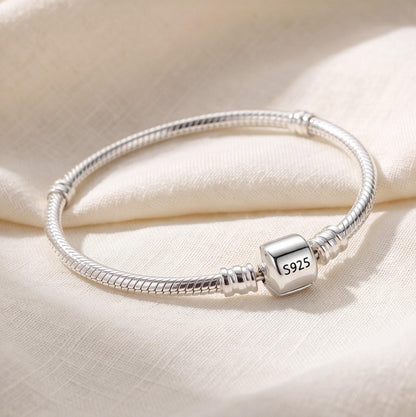 Snake Chain Charm worn on a charm bracelet
