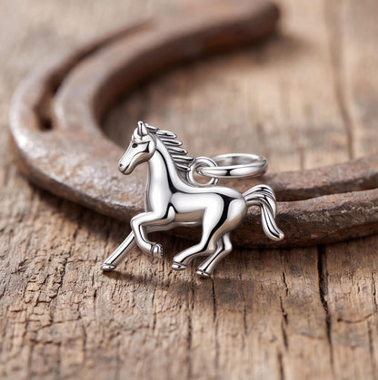 Galloping Horse Charm styled as a gift