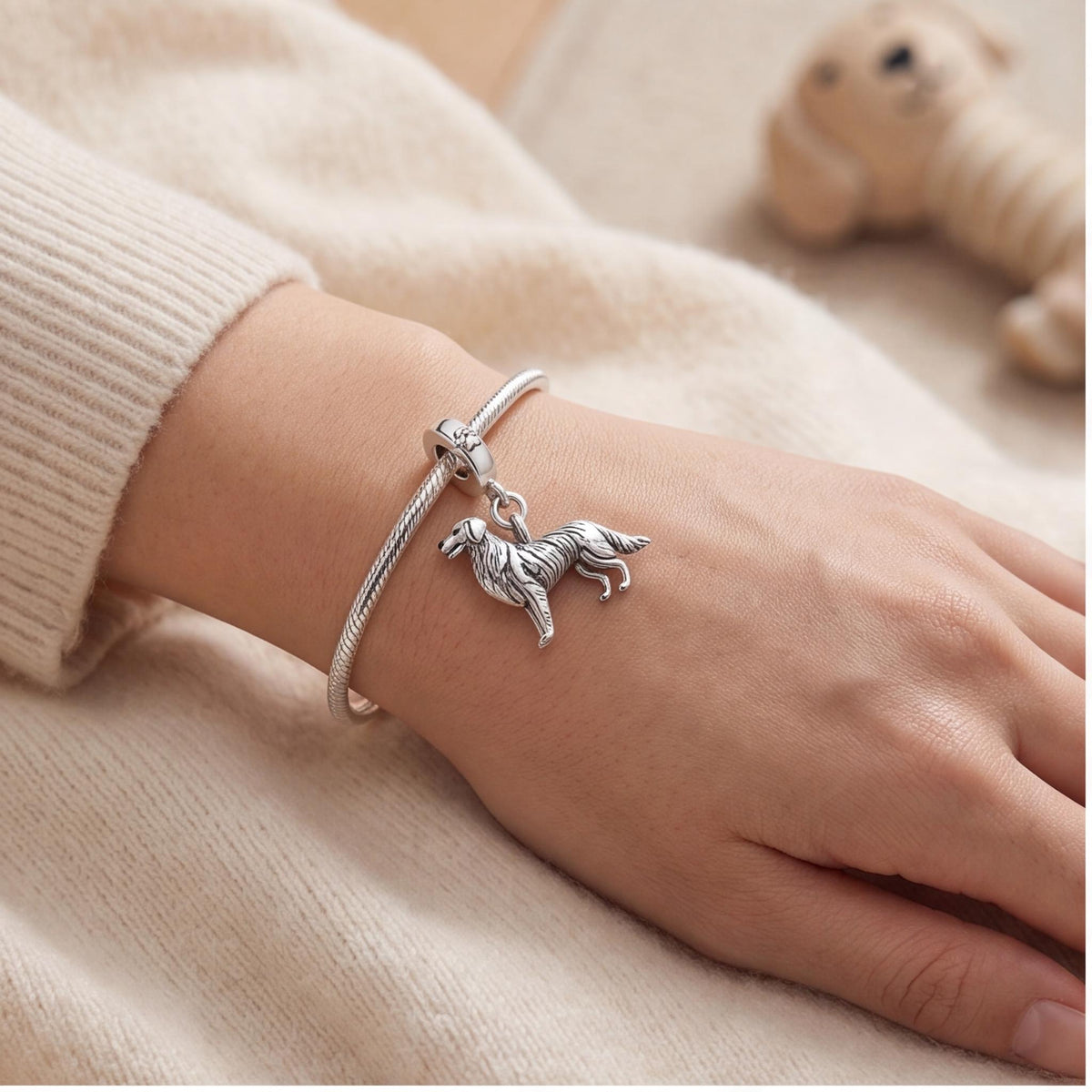 Golden Retriever Charm close-up on a bracelet