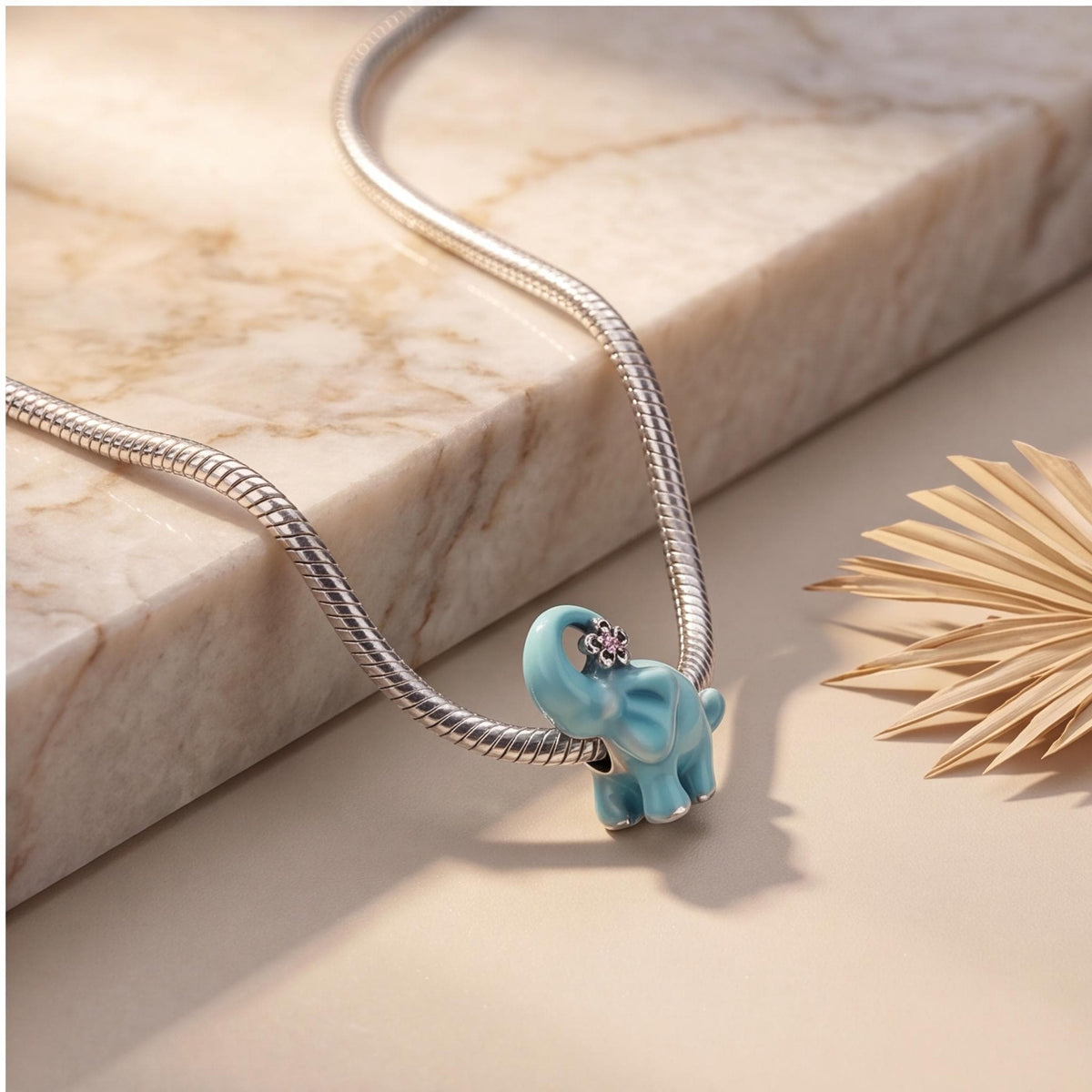 Blue Elephant Charm worn on a charm bracelet