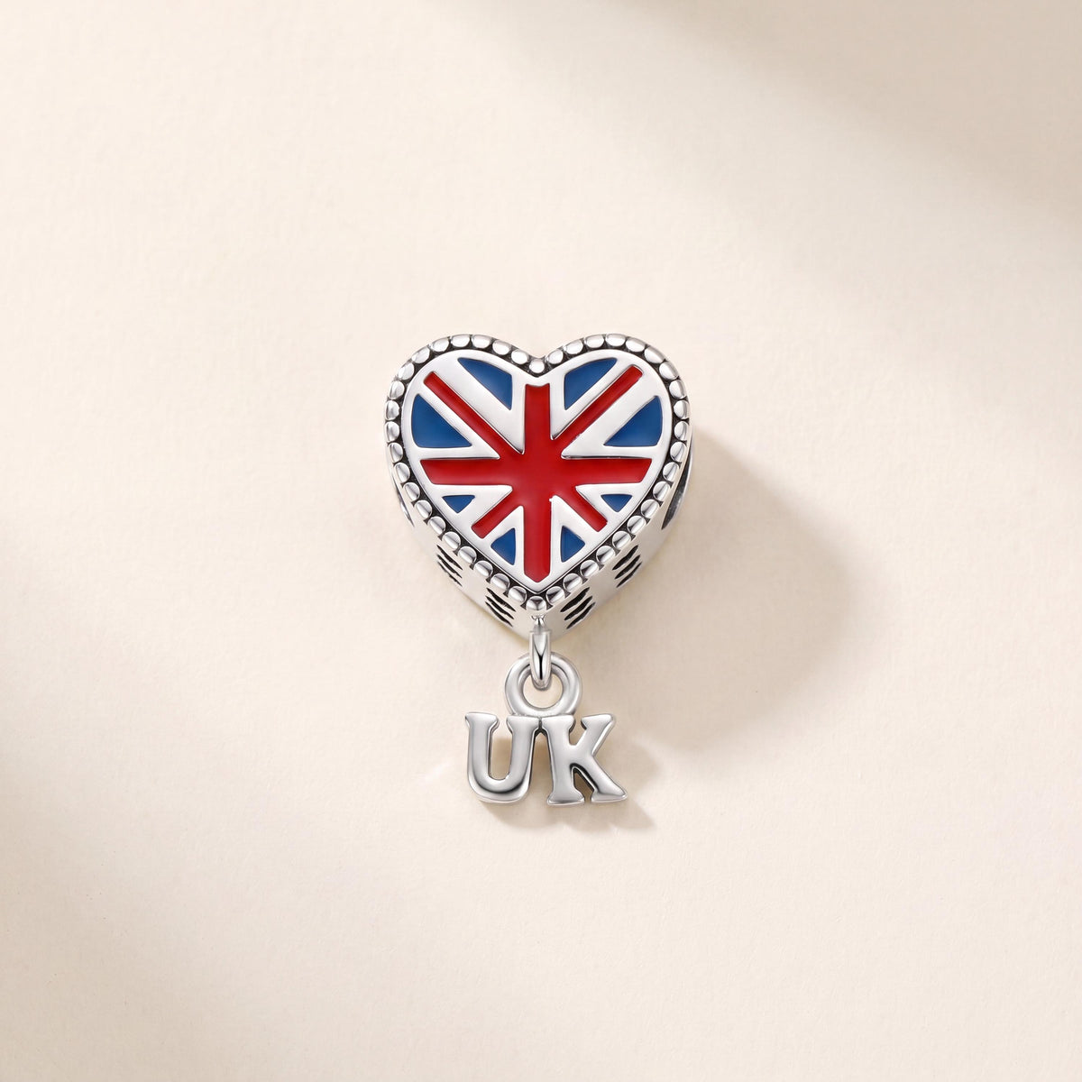 Union Jack Heart Dangle in 925 sterling silver with red and white enamel, fits European-style charm bracelets