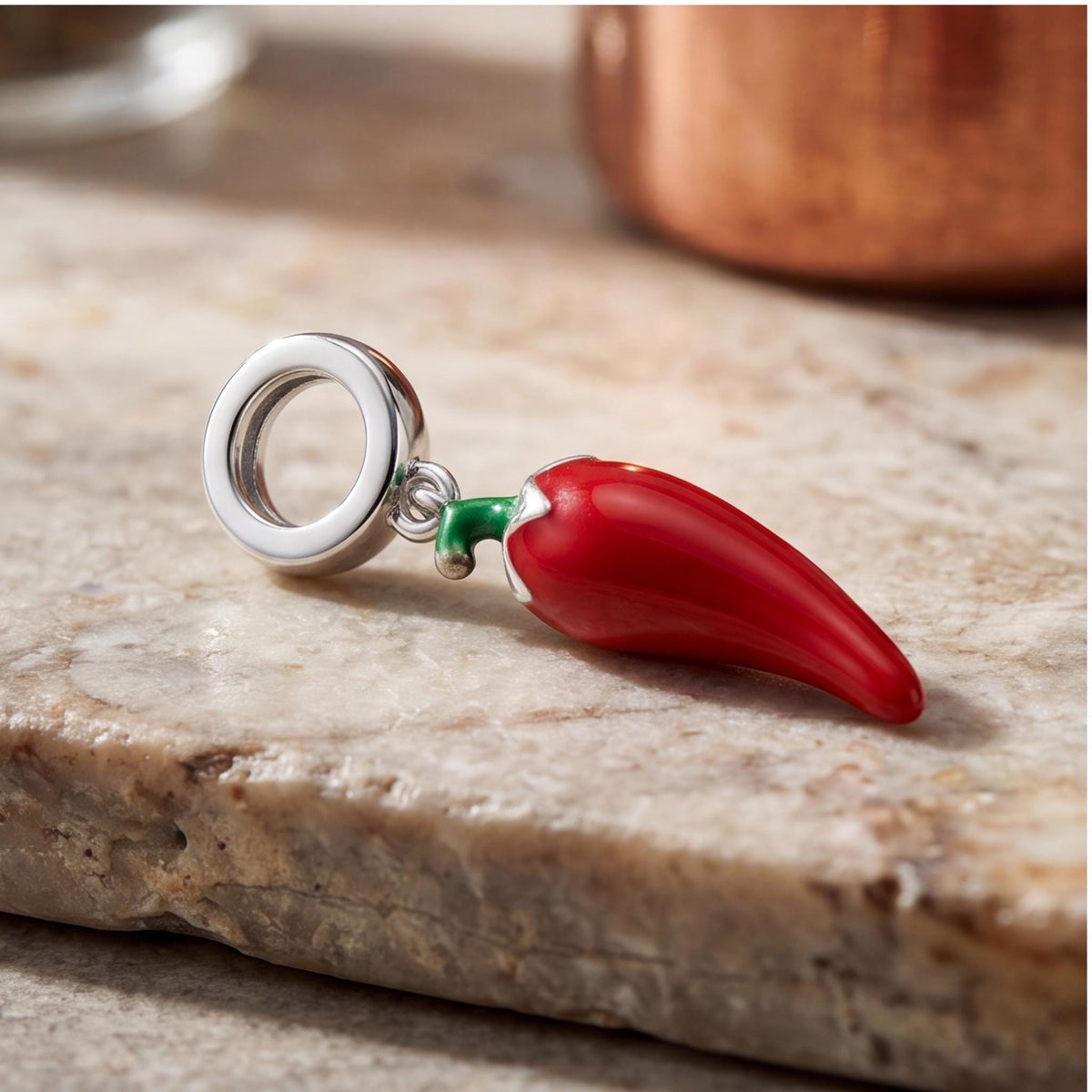 Red Chilli Pepper Charm on a silver charm bracelet