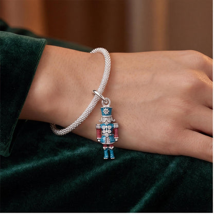 Nutcracker Soldier Charm close-up on a bracelet