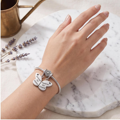 Sister Butterfly Charm worn on a charm bracelet