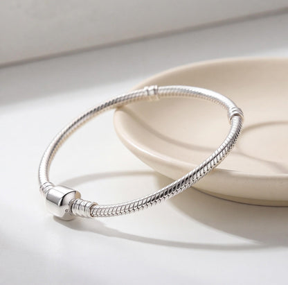 Snake Chain Charm styled as a gift