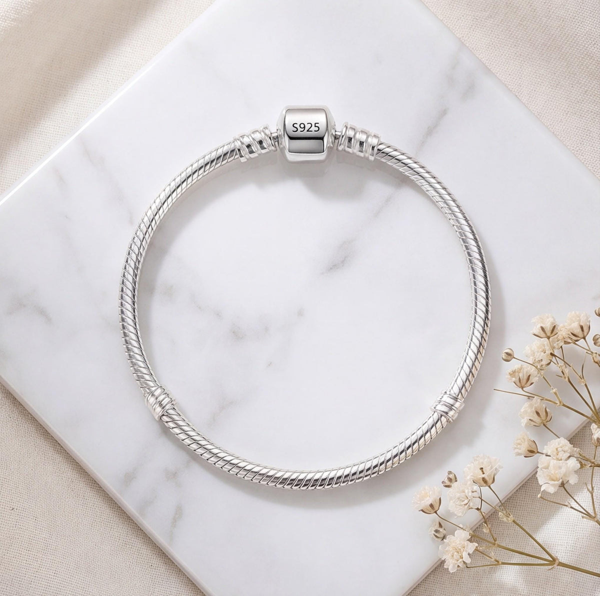 Snake Chain Charm on a silver charm bracelet