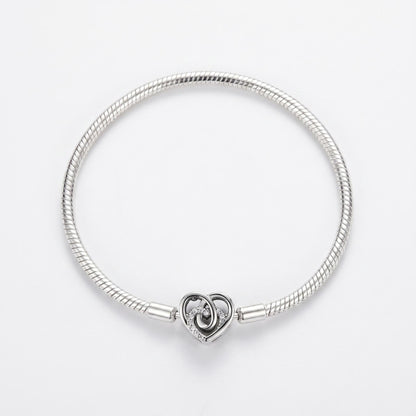 Sparkling Heart Clasp Charm in 925 sterling silver with sparkling stones, fits European-style charm bracelets