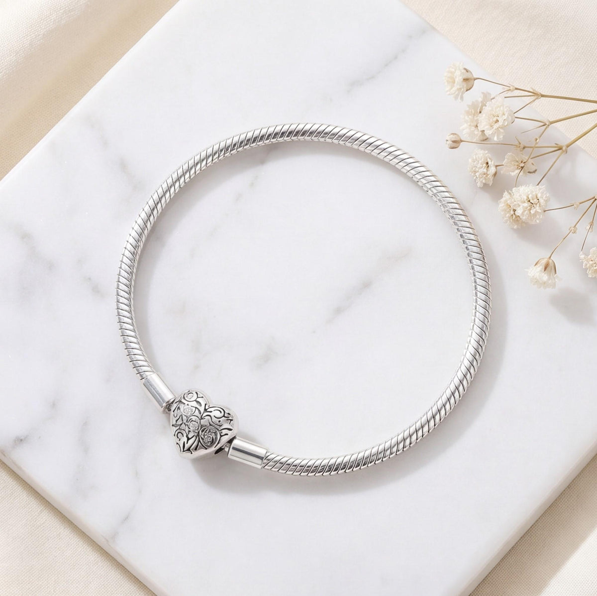 Heart Clasp Charm on a silver charm bracelet