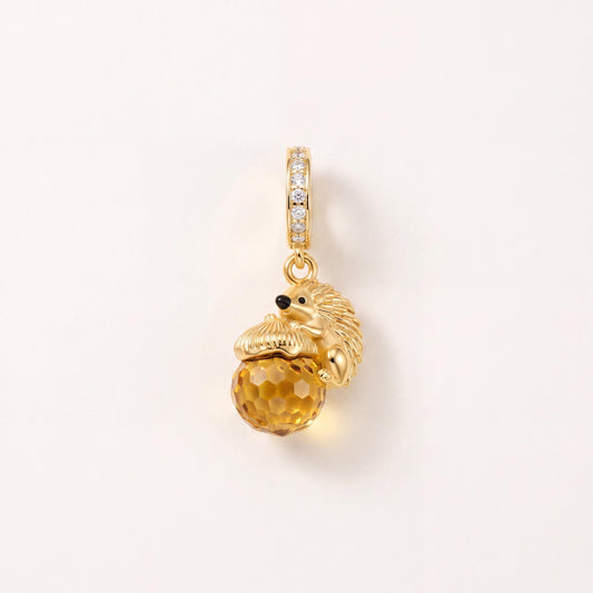 Hedgehog Acorn Charm in 925 sterling silver with gold and black enamel and sparkling stones