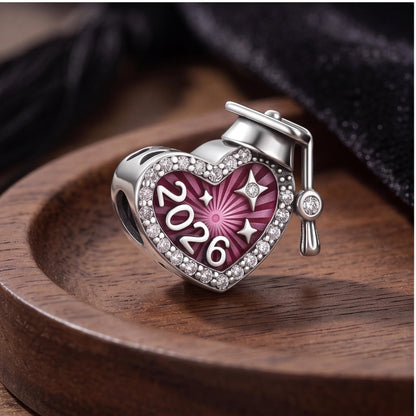 2026 Graduation Charm on a silver charm bracelet