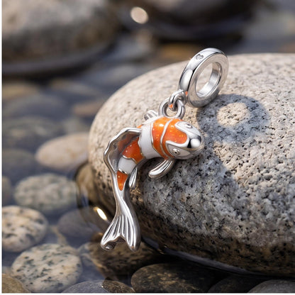 Koi Fish Dangle Charm close-up on a bracelet