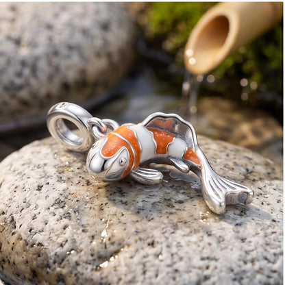 Koi Fish Dangle Charm on a silver charm bracelet