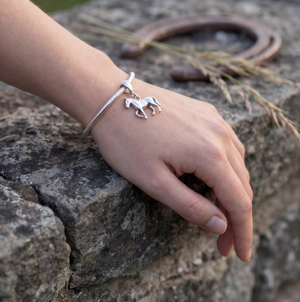 Galloping Horse Charm worn on a charm bracelet