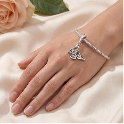 Butterfly Dangle Charm close-up on a bracelet