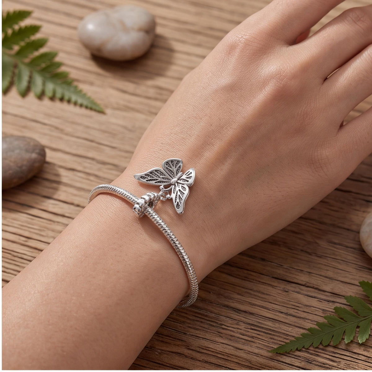 Butterfly Dangle Charm worn on a charm bracelet