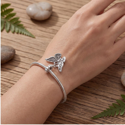 Butterfly Dangle Charm worn on a charm bracelet