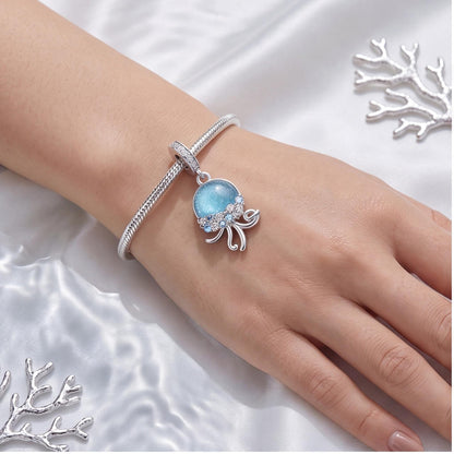 Jellyfish Dangle Charm close-up on a bracelet