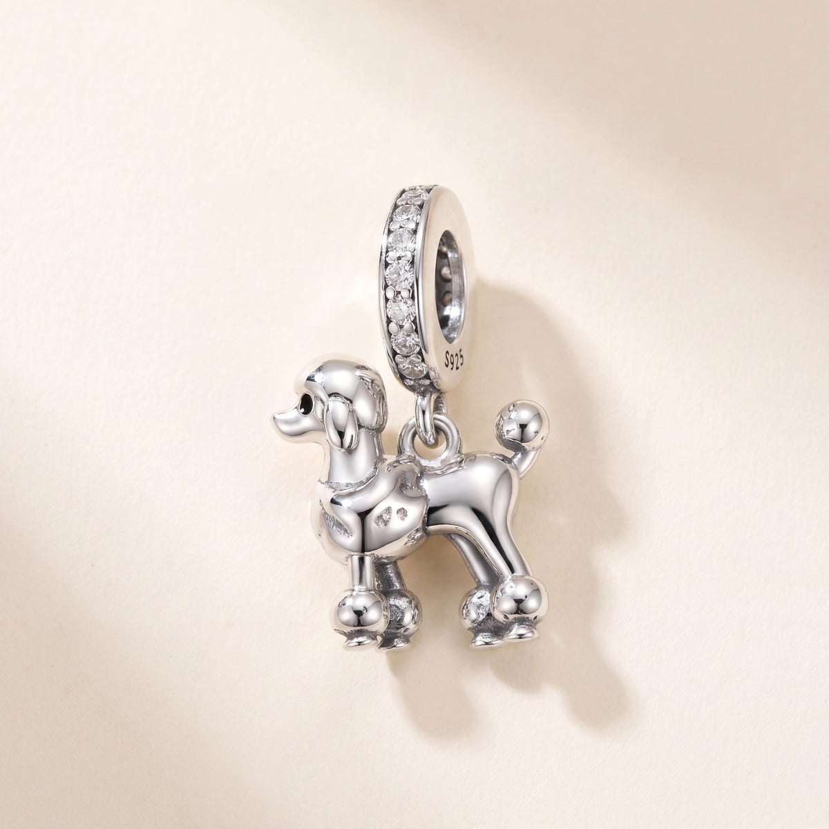 Poodle Dangle Charm in 925 sterling silver with sparkling stones, fits European-style charm bracelets