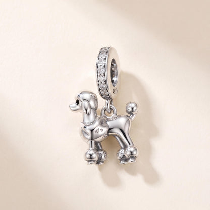 Poodle Dangle Charm in 925 sterling silver with sparkling stones, fits European-style charm bracelets