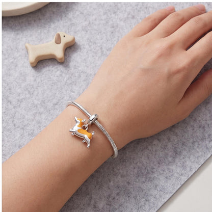 Corgi Dangle Charm close-up on a bracelet