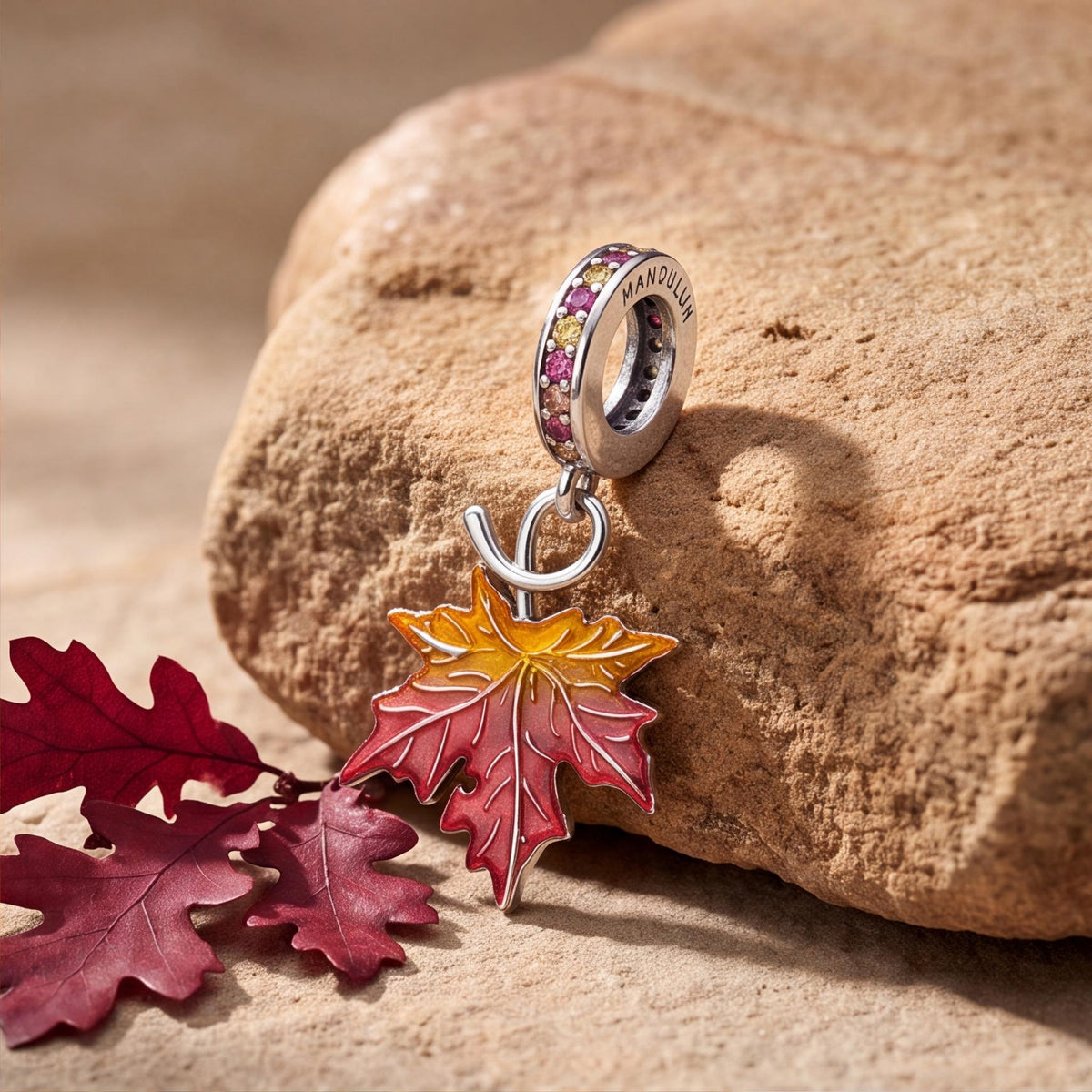 Autumn Maple Leaf Charm close-up on a bracelet