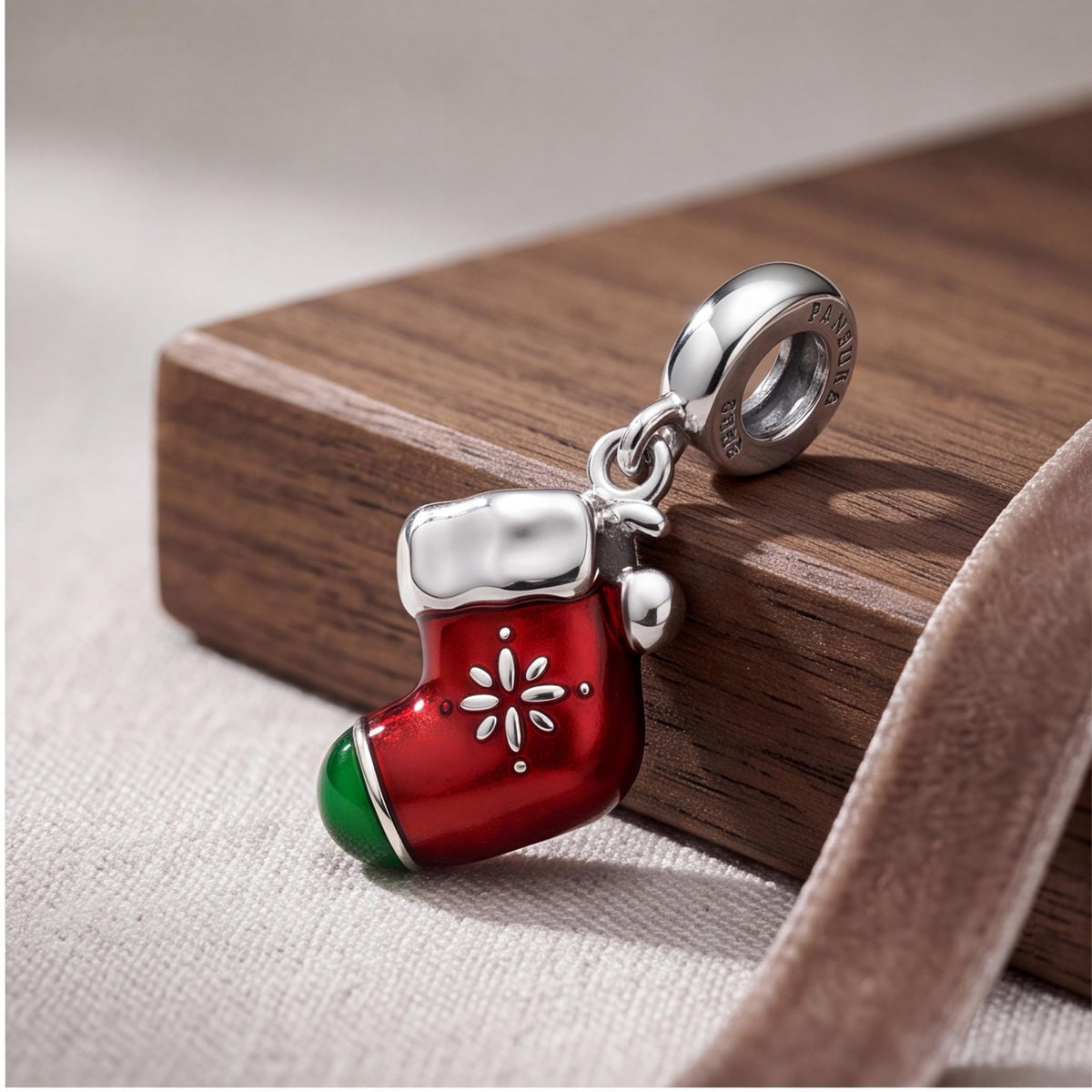 Christmas Stocking Charm on a bracelet with other charms