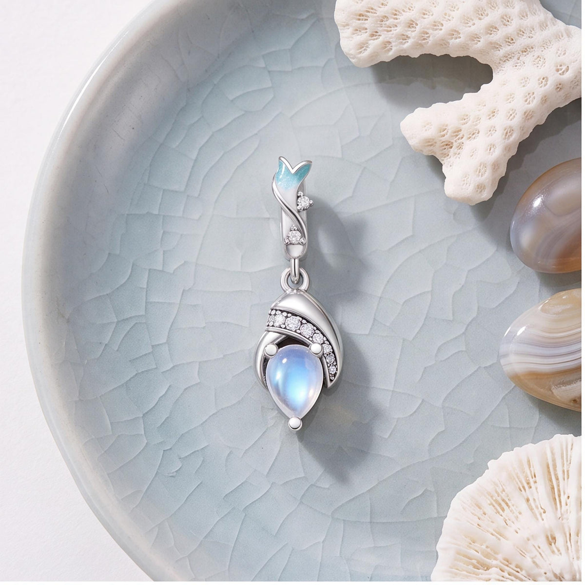 Moonstone Leaf Dangle on a silver charm bracelet