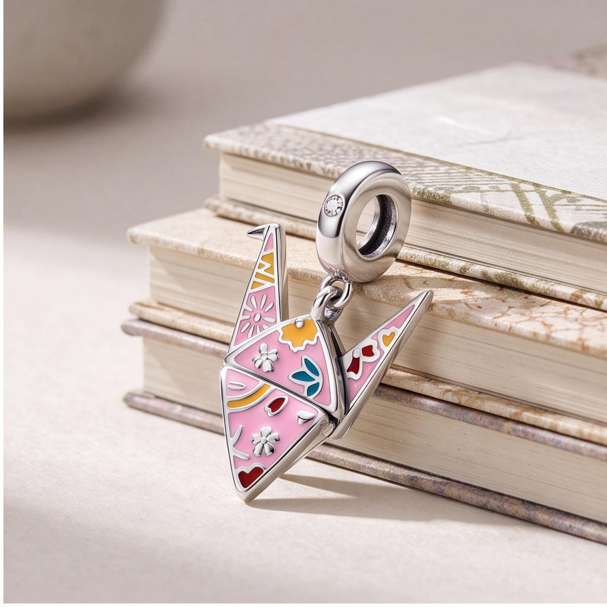 Origami Crane Dangle close-up on a bracelet