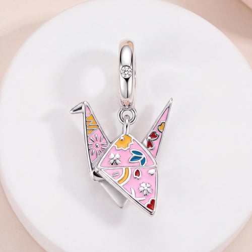 Origami Crane Dangle in 925 sterling silver with pink enamel and sparkling stones, fits European-style charm bracelets