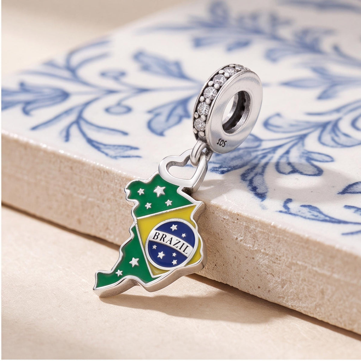 Brazil Map Charm on a bracelet with other charms