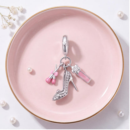 Glam Makeup Dangle Charm on a bracelet with other charms