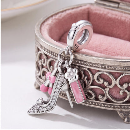 Glam Makeup Dangle Charm on a silver charm bracelet