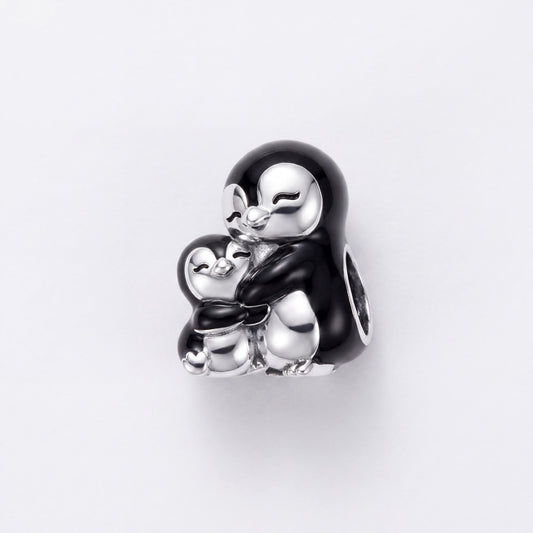 Penguin Hug Charm in 925 sterling silver with black enamel, fits European-style charm bracelets