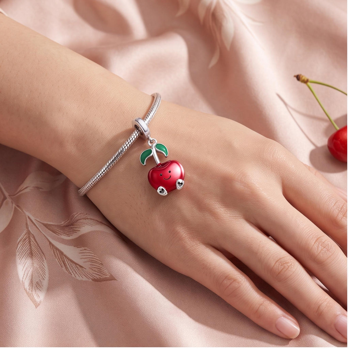 Smiley Apple Dangle Charm worn on a charm bracelet