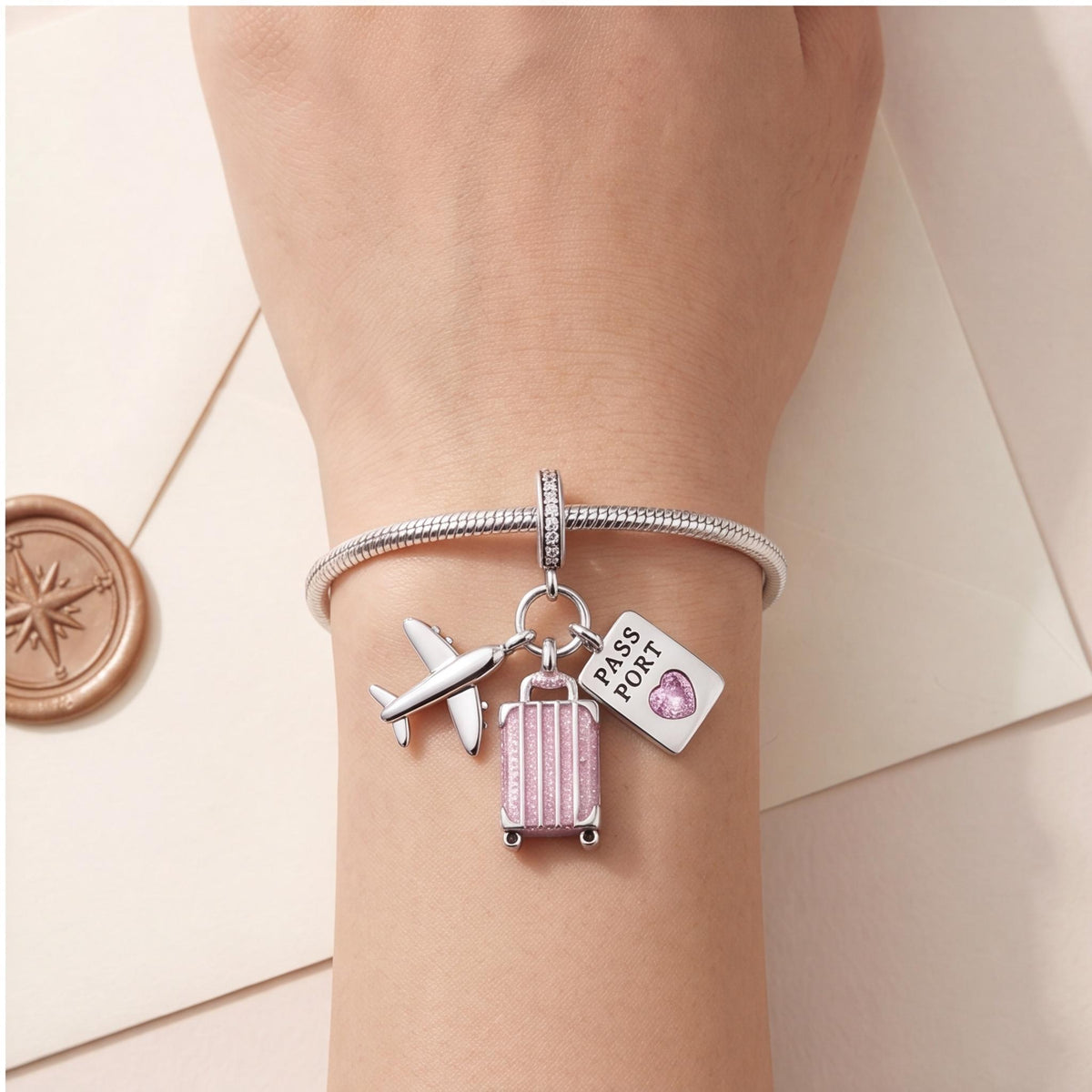 World Traveller Dangle worn on a charm bracelet