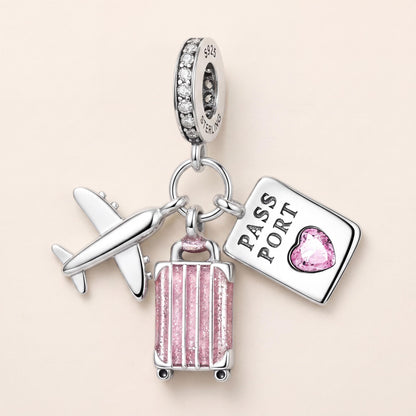 World Traveller Dangle in 925 sterling silver with pink enamel and sparkling stones, fits European-style charm bracelets