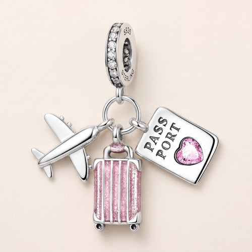 World Traveller Dangle in 925 sterling silver with pink enamel and sparkling stones, fits European-style charm bracelets