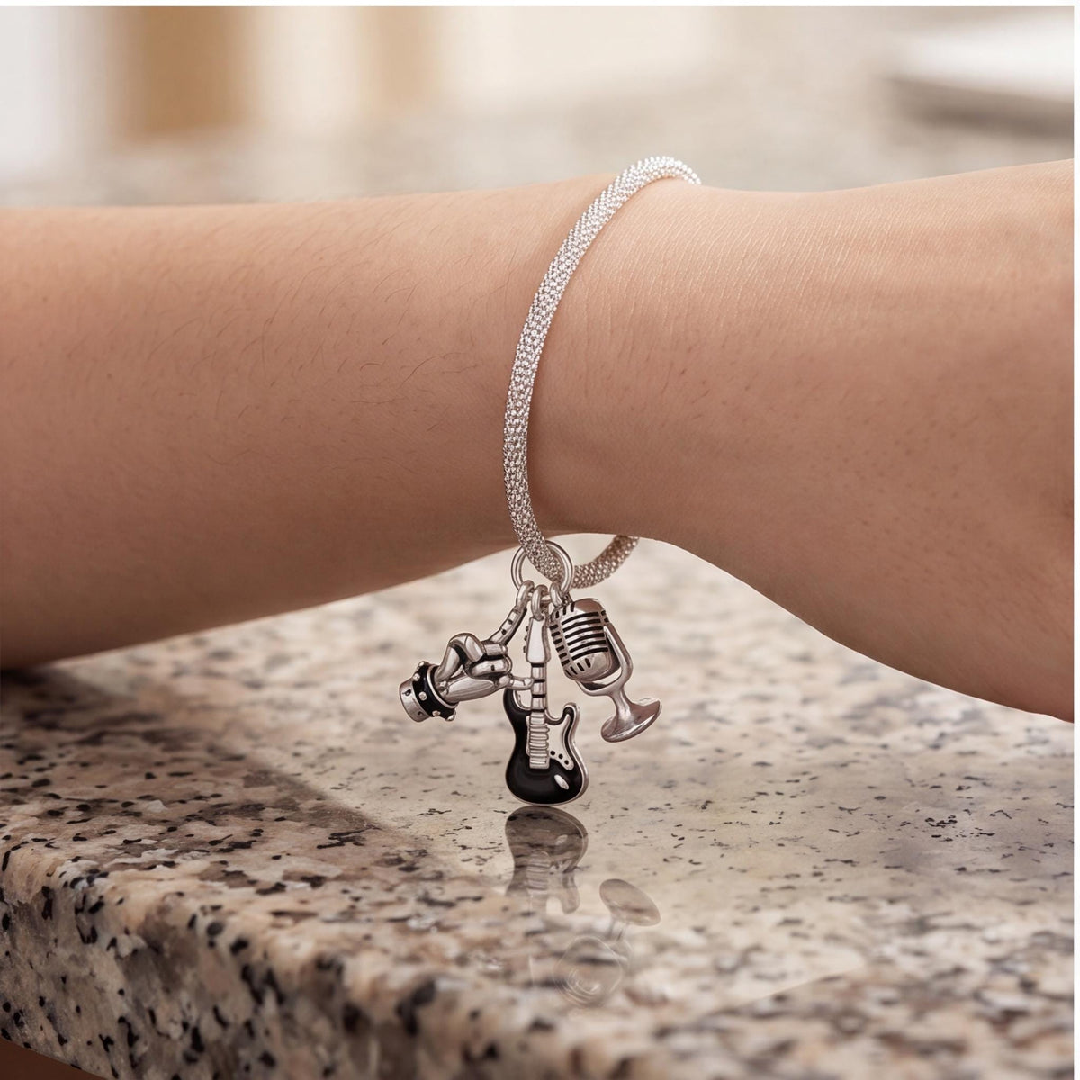 Rock Music Dangle worn on a charm bracelet