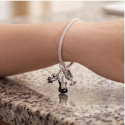Rock Music Dangle worn on a charm bracelet