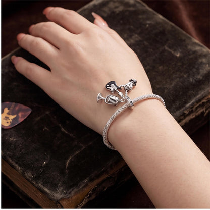 Rock Music Dangle close-up on a bracelet