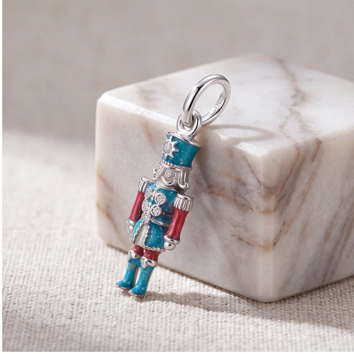 Nutcracker Soldier Charm styled as a gift