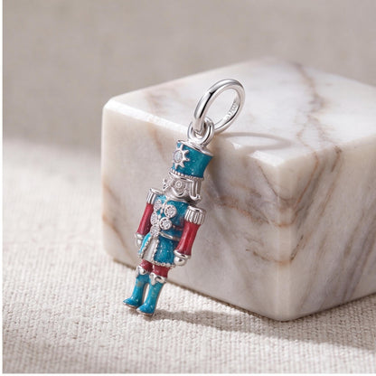 Nutcracker Soldier Charm styled as a gift