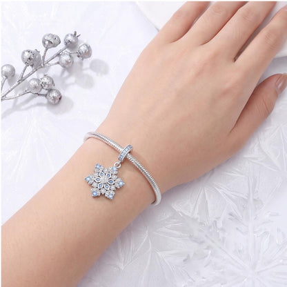 Blue Snowflake Dangle Charm styled as a gift